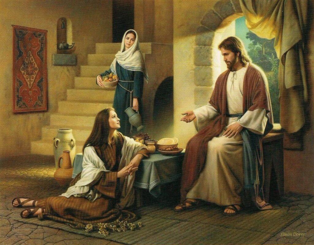 Cenário de uma casa da época bíblica. 
Jesus sentado em um banco próximo à janela e uma mulher aos seus pés ouvindo-o atentamente.
No fundo, outra mulher em pé ocupada, segurando objetos de casa.